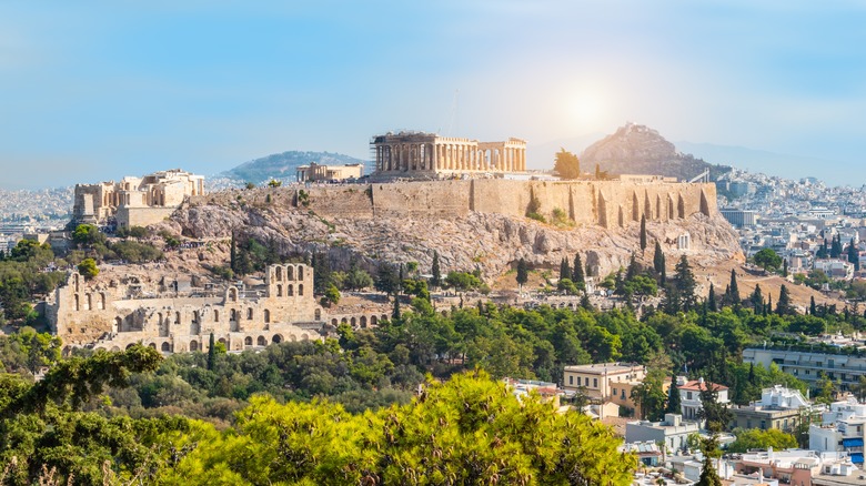 Panoramic view of Athens with Acropolis hill on a hot summer day in Greece. Travel image of a heatwave in Athens.