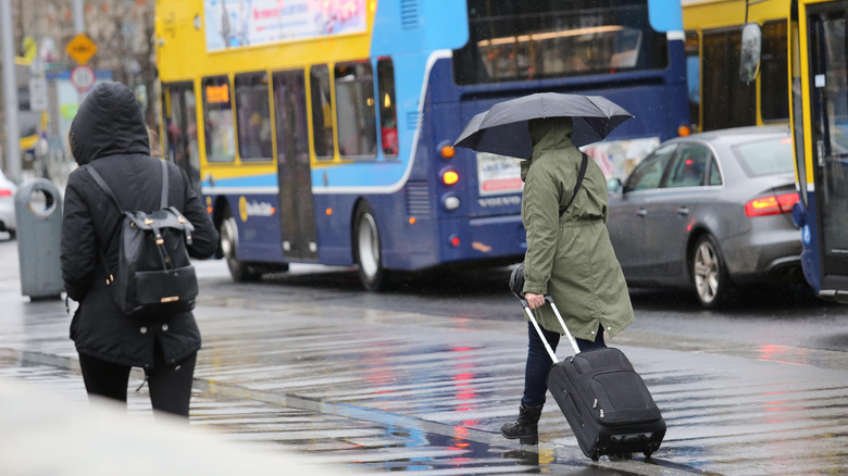 People with umbrellas in the rain in Ireland