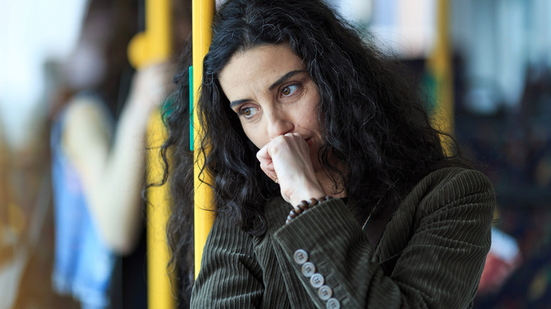 Nervous woman on a bus