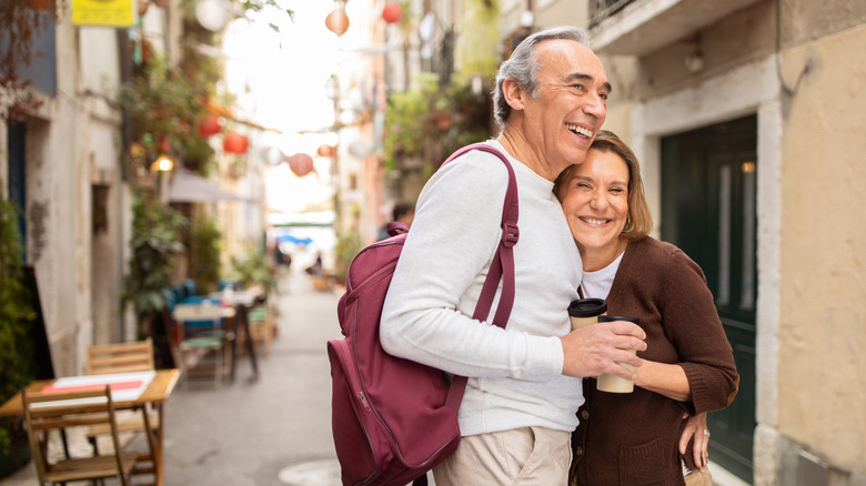 Happy couple enjoying a trip overseas