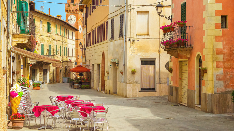 Cafe tables and chairs outside in Tuscany, Italy