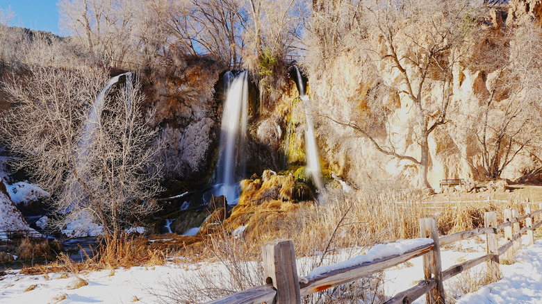 Trio of waterfalls cascades off a ridge at the Rifle Falls State Park, Colorado