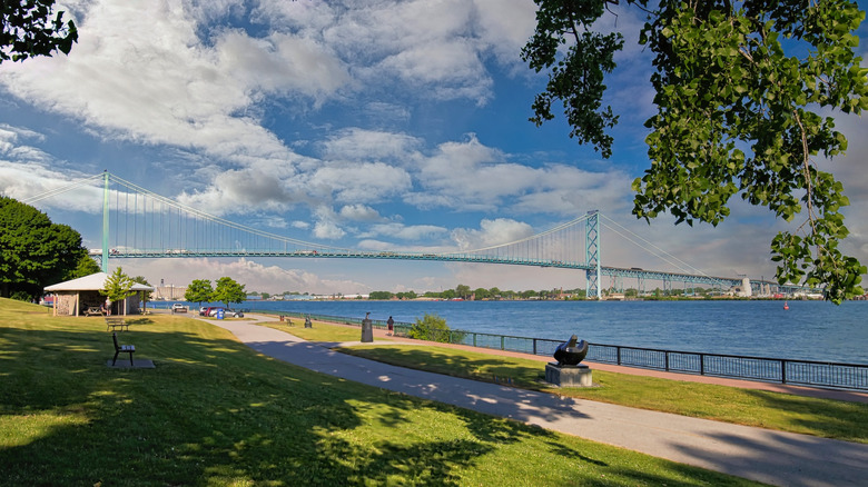 The Windsor Sculpture Park with the Ambassador Bridge in the background on a clear evening