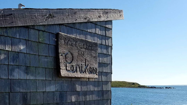 Penikese Island sign with bird in background