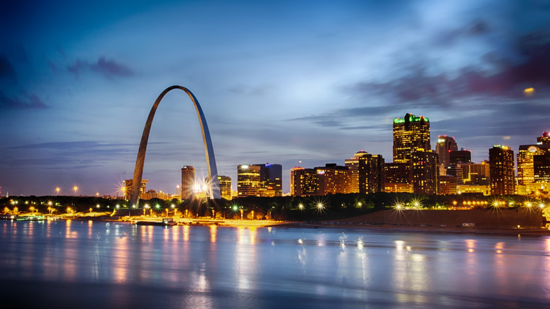 The Gateway Arch and St. Louis skyline at night, as seen from the Mississippi River