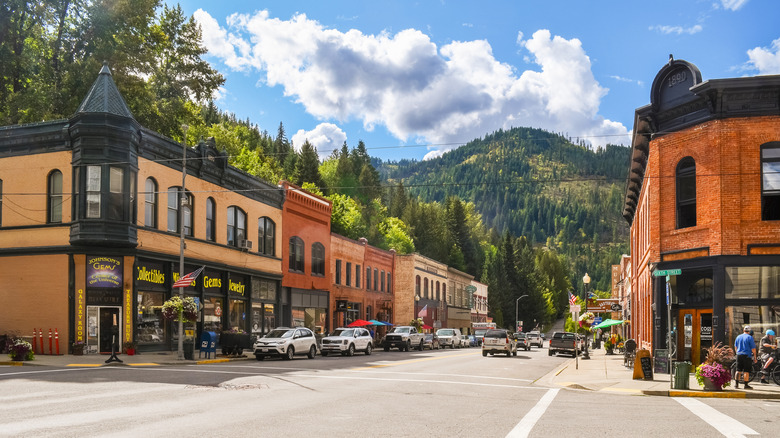 A view down Main Street in Wallace showing the surrounding mountains