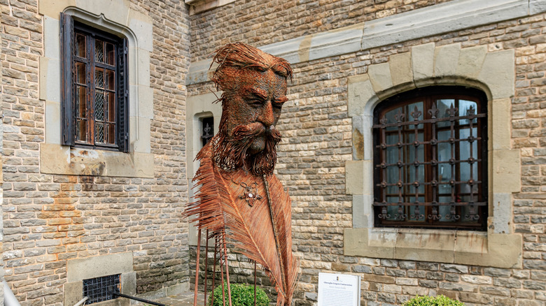 Statue of a man at a castle in Romania