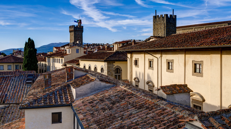 View across the tiled rooftops and towers in Arezzo Italy.
