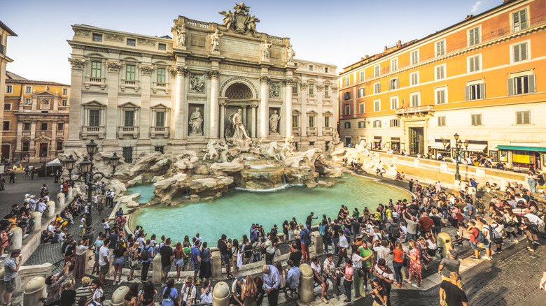 Rome's Trevi Fountain surrounded by tourists