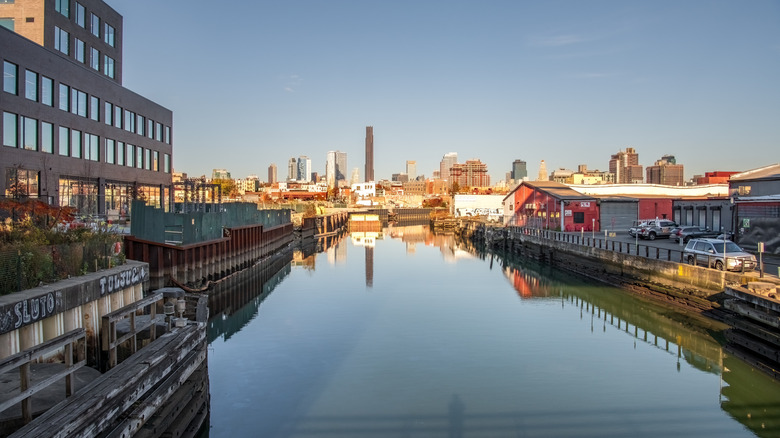 A view on the Gowanus Canal out to the Brooklyn skyline