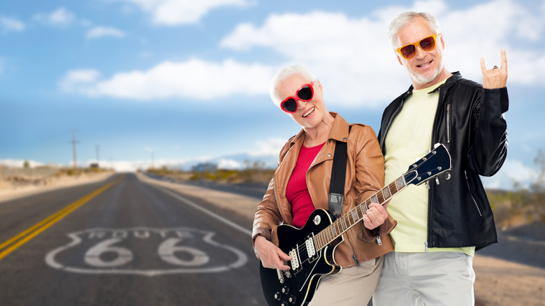 Older couple getting their kicks on Route 66