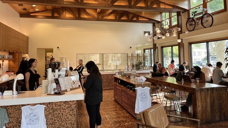 Warmly lit interior of Temple Coffee Roasters in Sacramento