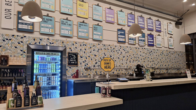 Tap list and drinks counter at Urban Roots Brewery and Smokehouse