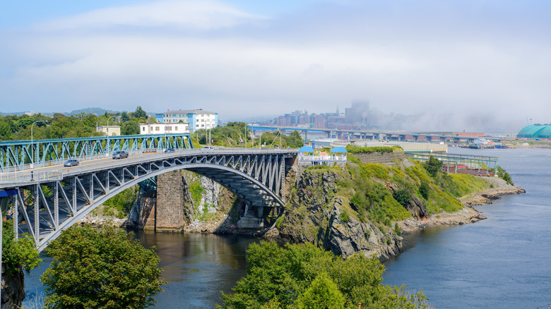 A picturesque bridge over a rocky shoreline in Saint John, New Brunswick, Canada