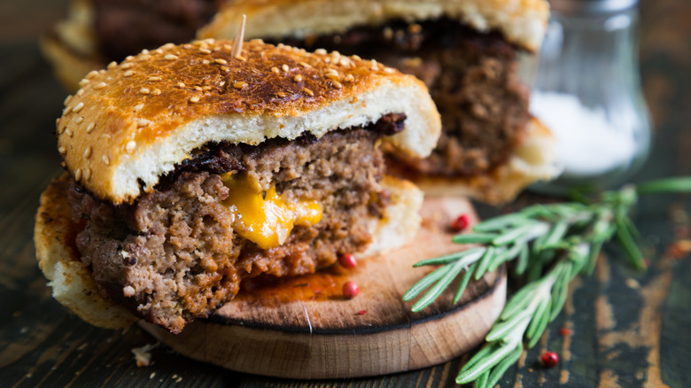 A burger with cheese stuffed in the patty