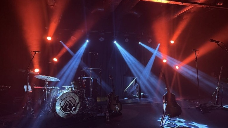 Stage with lights and instruments set up at The State Room