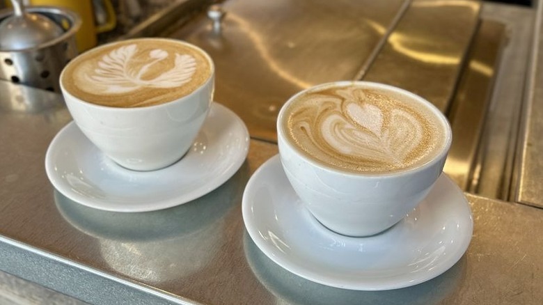 Seasonal lattes on counter at Publik Coffee Roasters