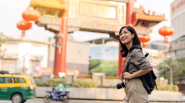 A woman exploring a city alone