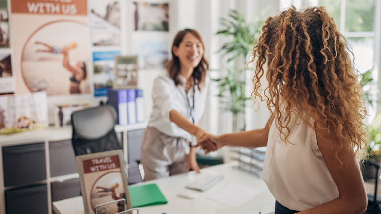 Woman speaking to a travel agent
