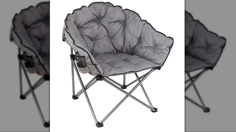 A close-up of a gray Member's Mark Cozy Club Chair against a white background.