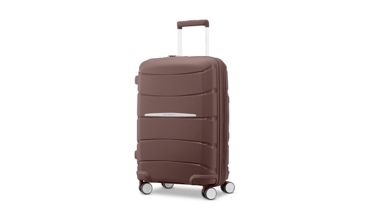 The Samsonite Outline Pro Carry-On Spinner againstt a white background