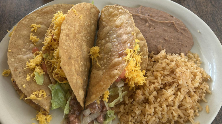 Tacos, rice, and beans on a plate at Garcia's Mexican Food in San Antonio, Texas