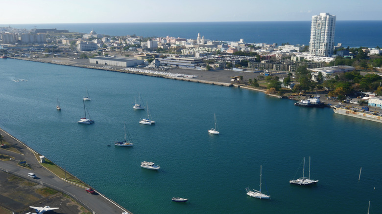 Yachts and boats dot the stretch of blue bay in between Old San Juan and the Isla Grande Airport in Puerto Rico