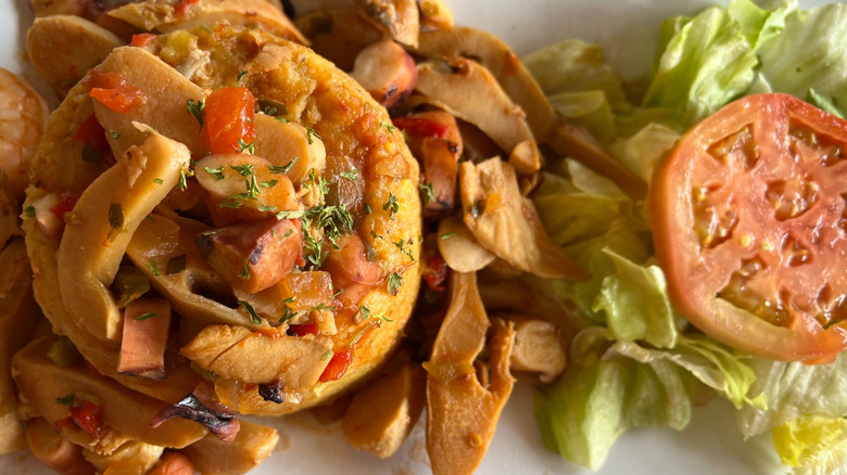 mofongo with seafood and salad