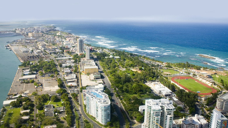 Aerial view of the Northern side of Puerto Rico between Puerta de Tierra and Fuerte de San Geronimo with Old San Juan in rear