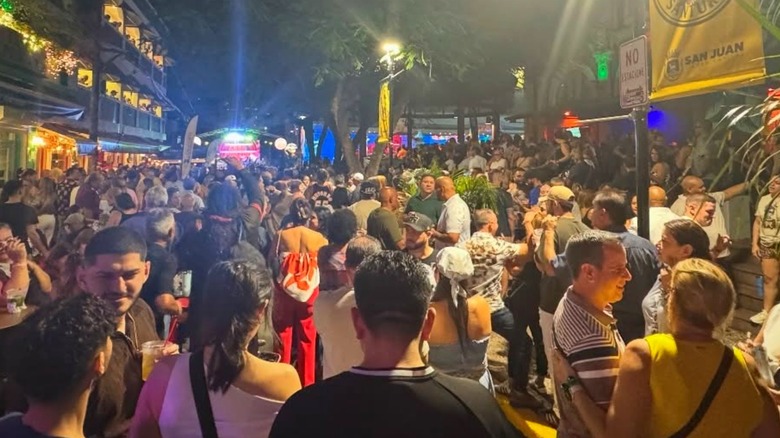 Crowd of people at night at La Placita in Santurce in San Juan, Puerto Rico