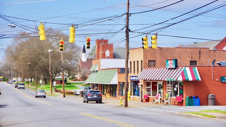 Stoplights and building facades in downtown Claremont, North Carolina