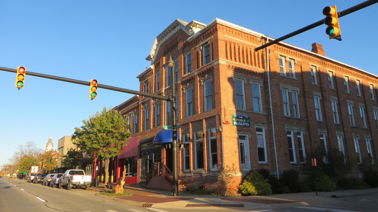Intersection of West Street and East Chicago Street in Jonesville, Michigan, with view of buildings and cars