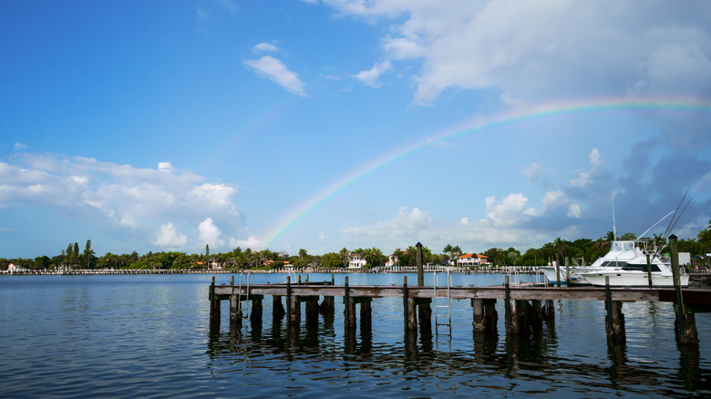 A rainbow over a dock in Lantana