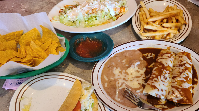 Chips, salsa, enchiladas, fries, caesar salad, and a taco from La Campesina in Willard, Ohio
