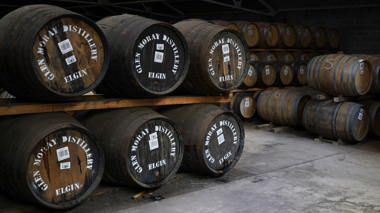 Wooden whisky barrels at the Glen Moray Distillery in Elgin, Scotland