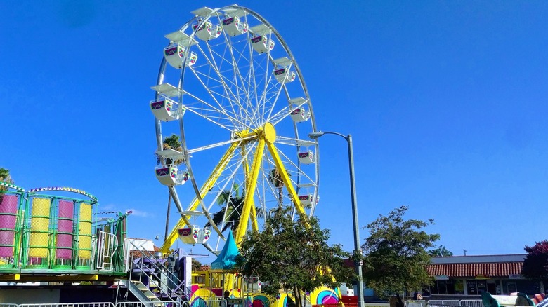 Carnival rides, including a Ferris wheel, at the La Habra Corn Festival