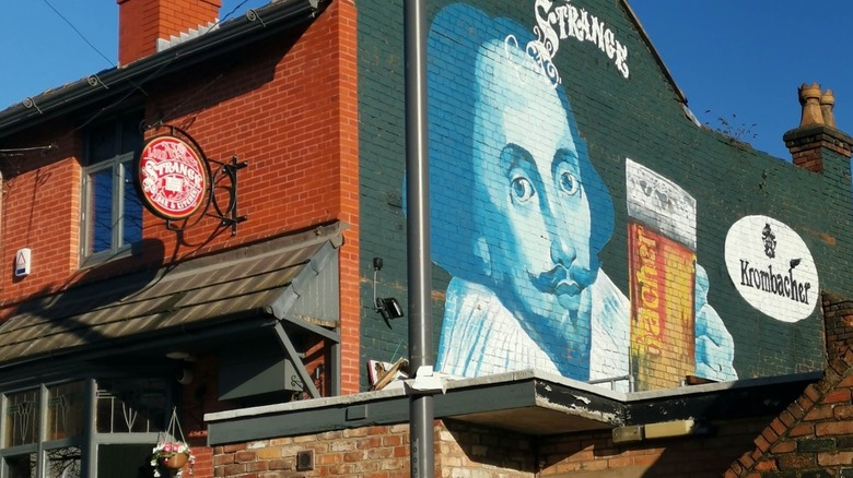 Shakespeare mural on side of brick building Lord Strange Prescot