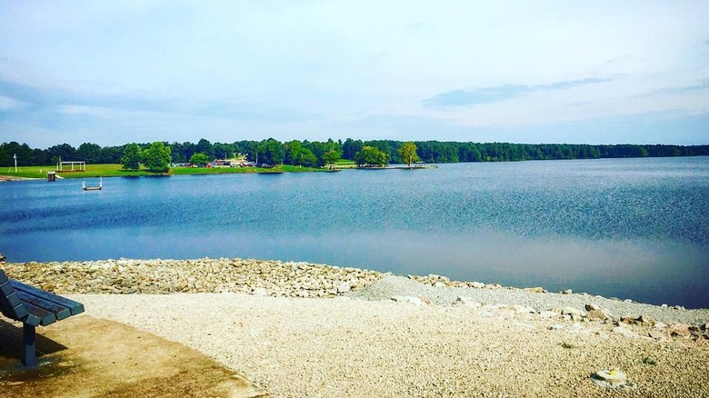Man kayaking during sunset at Beech Lake, Tennessee