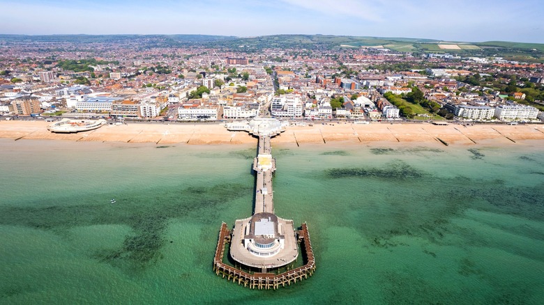 Aerial panorama of the British seaside city of Worthing and its pier