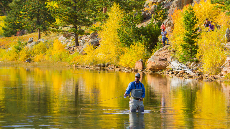 man fishing near Drake in the Big Thompson River