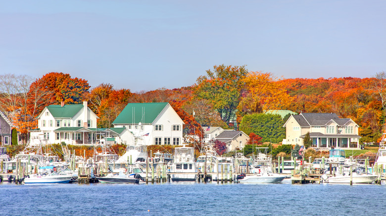 Buildings and boats on the marina in East Lyme on an autumn day
