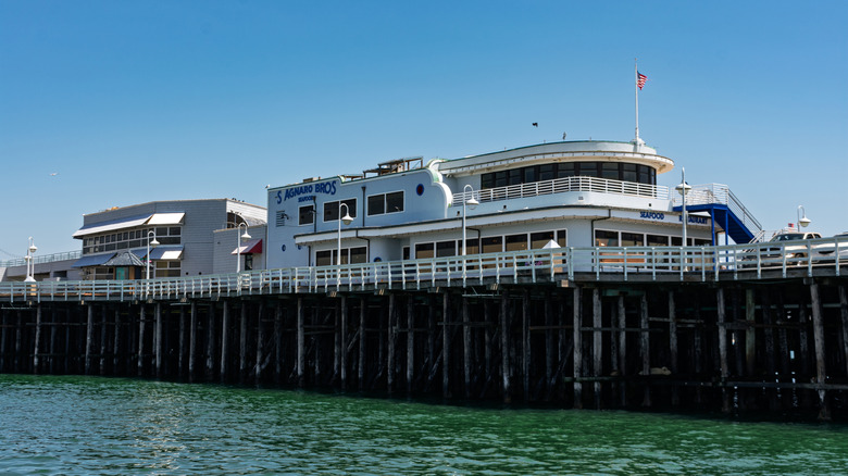 Stagnaro Bros restaurant perches at the end of the Santa Cruz Municipal Wharf on a cloudless, sunny day.
