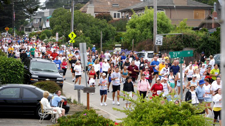 Runners in the Wharf to Wharf Race on a residential street