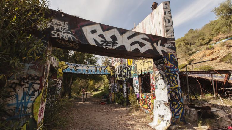Hiking under graffitied ruins at Rustic Canyon