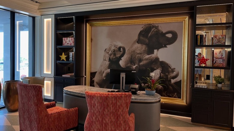 An oversized black-and-white circus photograph in the lobby of the Cirque St. Armands Beachside Hotel