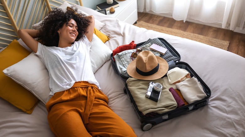 Person packing luggage