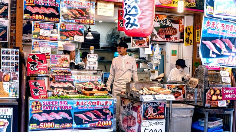 Fresh seafood, sushi, and other local snacks and delicacies at Tokyo's Tsukiji Fish Market.