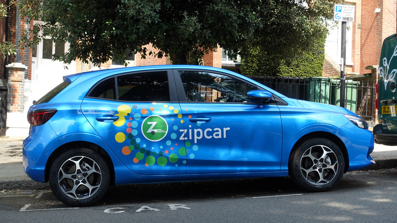 Car with the Zipcar logo across its side