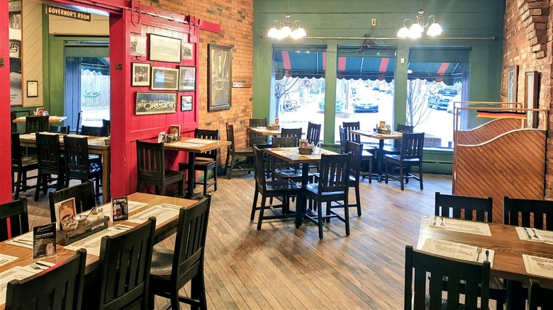 Interior of Schmidt's Sausage Haus und Restaurant in Columbus, Ohio, with empty tables at daytime