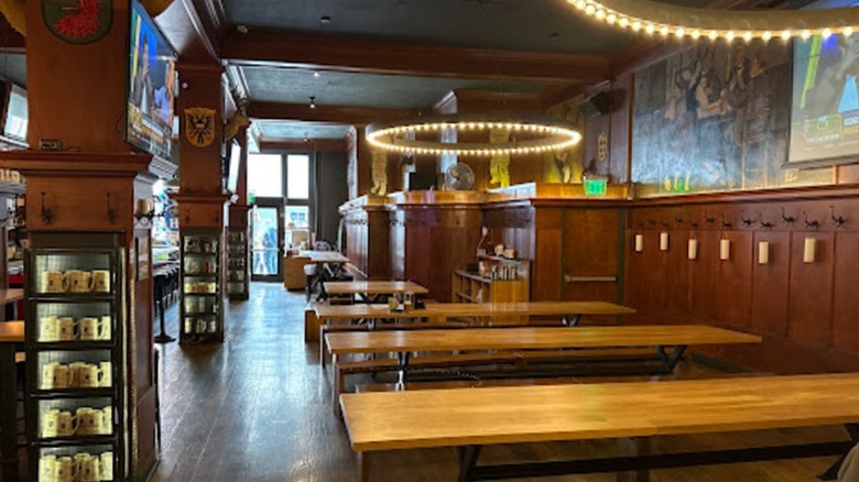 Communal tables, wood paneling, murals, and stein lockers are part of the interior at Schroeder's